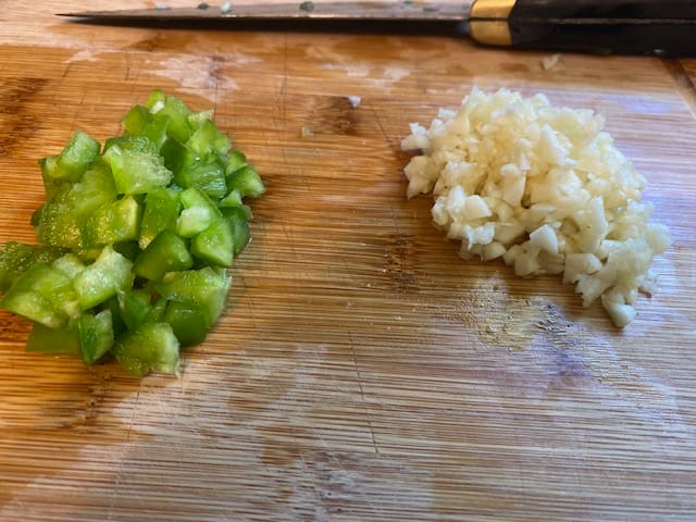 Chopped green pepper and garlic