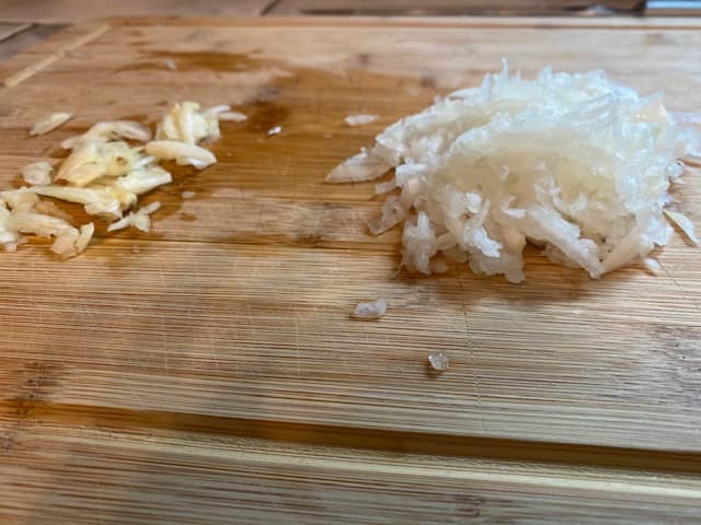 Grated onion and crushed garlic