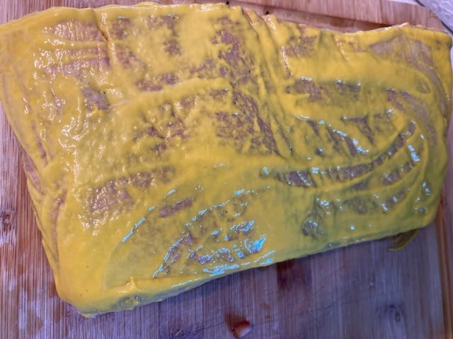 Brisket covered with Mustard